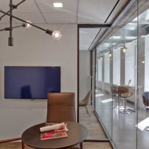 modular-walls-glazed-with-clear-anodized-extrusions-polycarbonate-joints-and-framed-pivot-doors-with-polished-ladder-pulls-1024x576