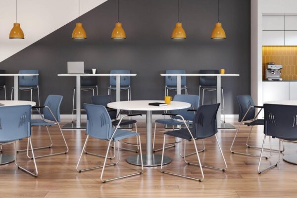 Blue and Black Tela Bistro Stools and Tela Guest chair with Arms Arraigned around White Circular Tables